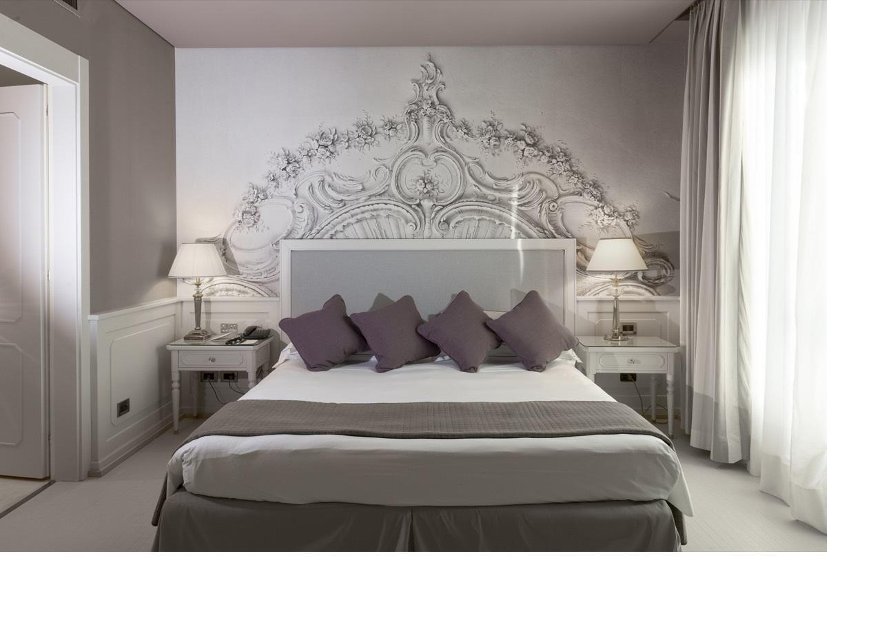 Grand Hotel De La Ville Parma Esterno foto A bedroom at the hotel