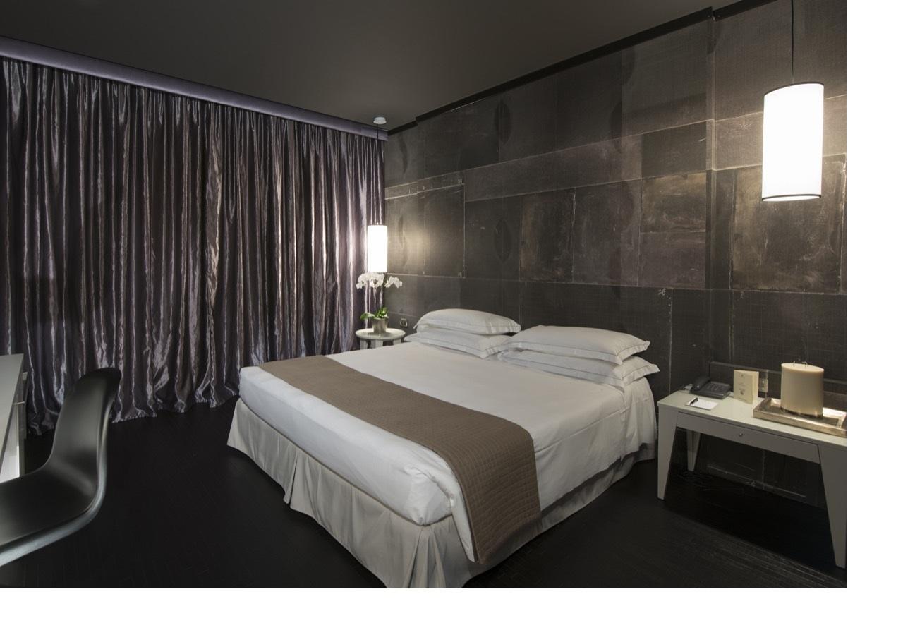 Grand Hotel De La Ville Parma Esterno foto A room at the hotel